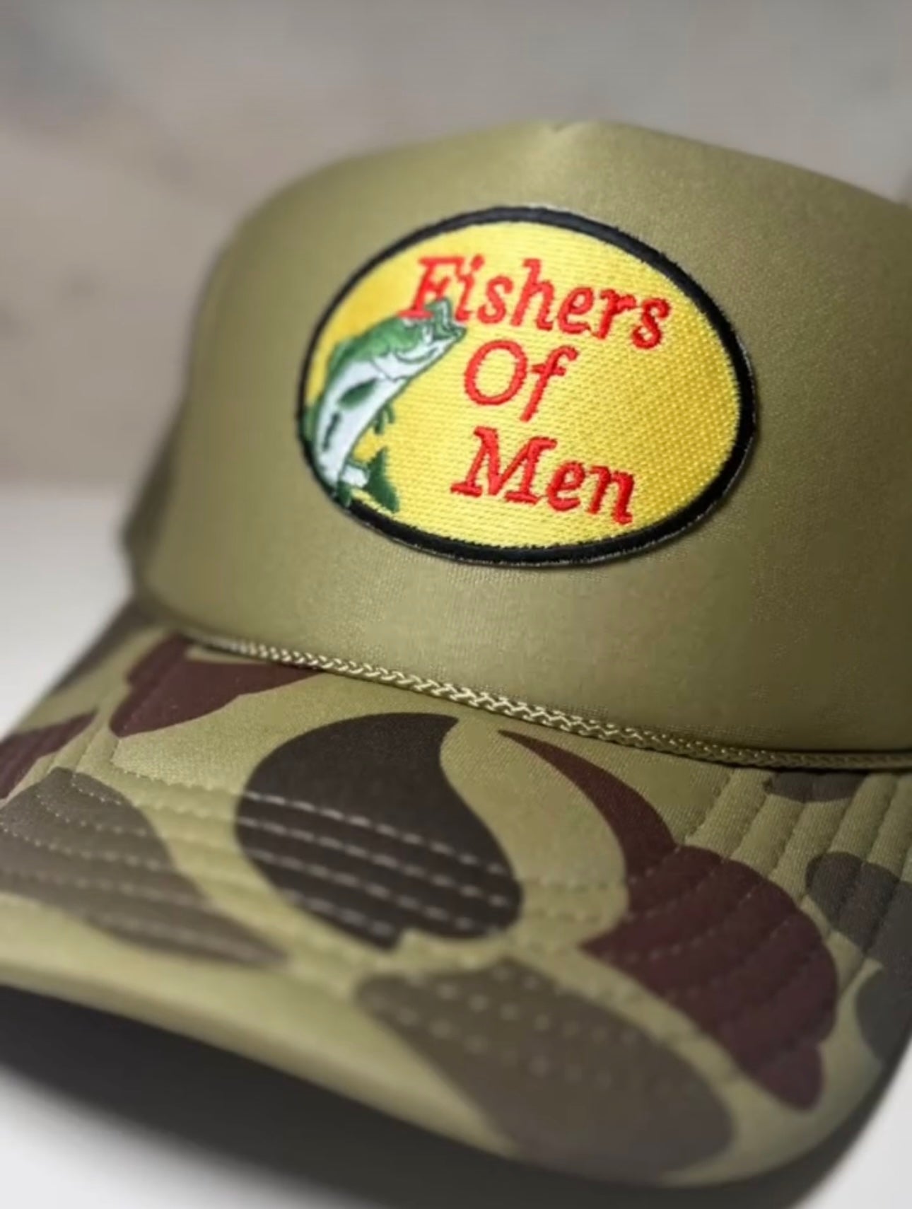 Fishers of Men on light camo trucker