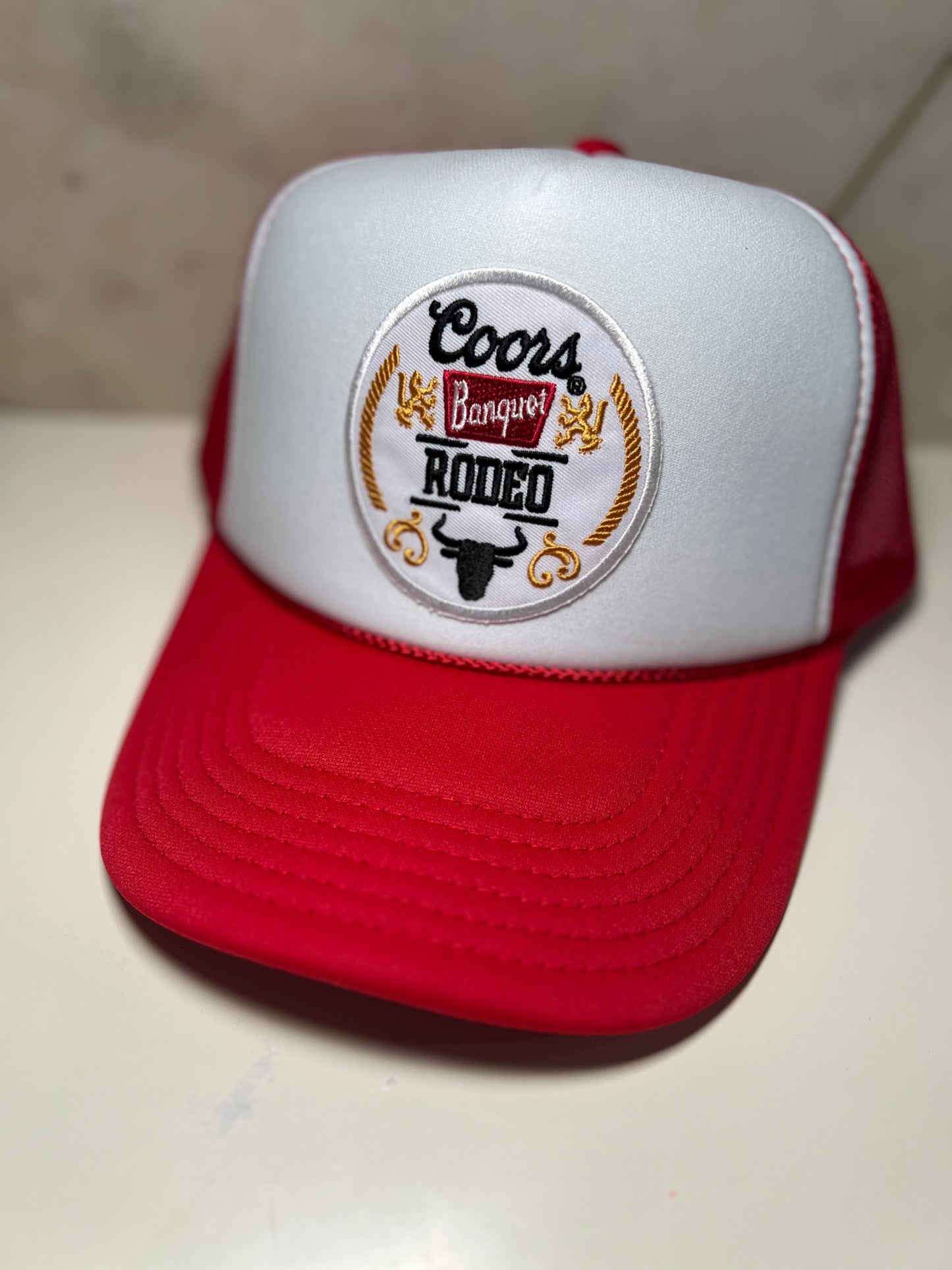 Rodeo on Red & White Trucker